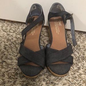 Toms sandals worn a few times. Feet grew after baby.